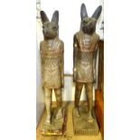 A pair of very large 20thC carved wooden standing Anubis / Ancient Egyptian dog god statues with