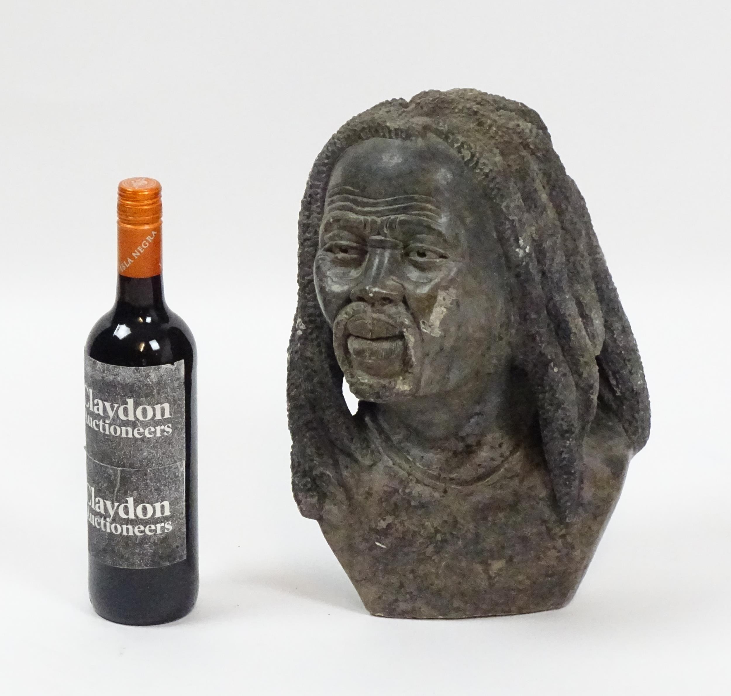 Ethnographic / Native / Tribal : An African carved soapstone bust modelled as a man with dreadlocks. - Image 3 of 6