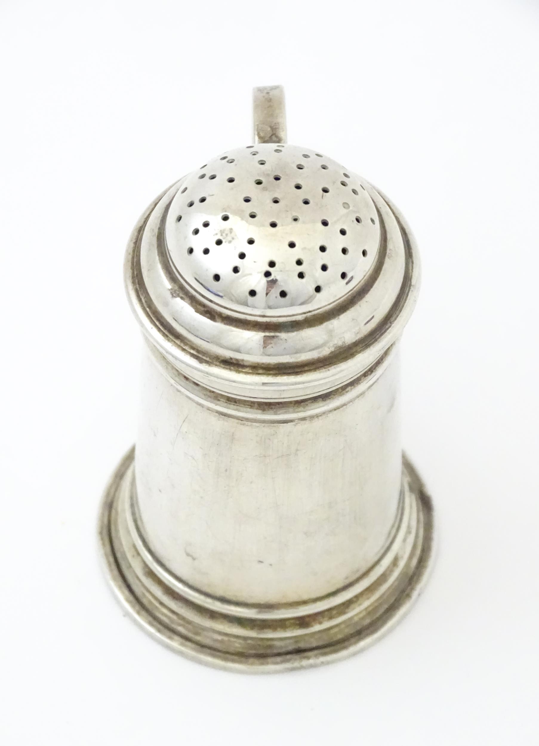 An American sterling silver pepperette modelled as a flour shaker. Marked under Georg Jensen Inc, - Image 5 of 8