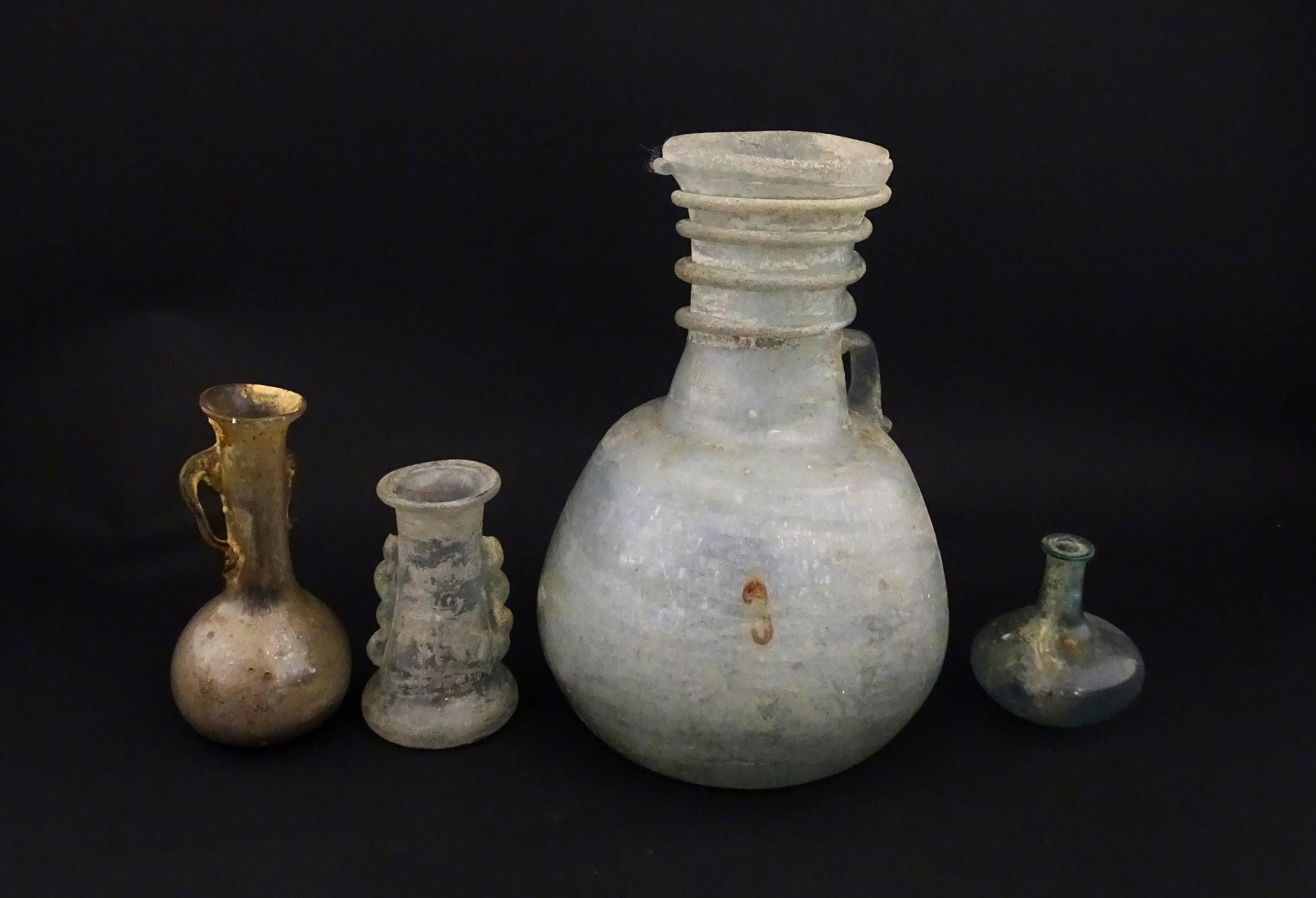 Four glass vases in the Roman style with iridescent finish, some with trail detail. Largest - Image 4 of 6