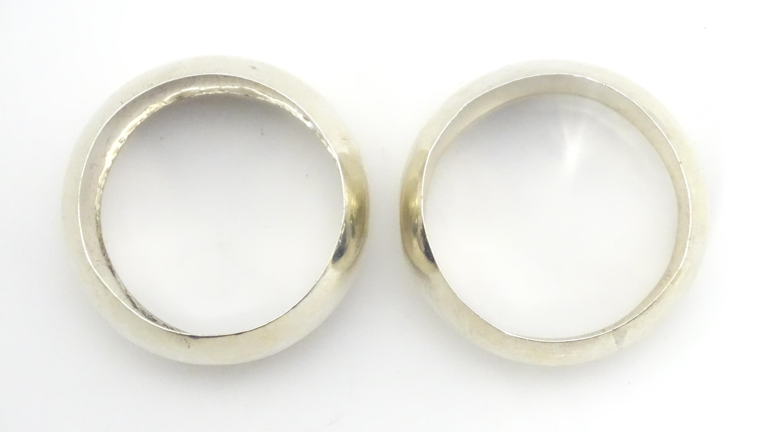 A pair of silver napkin rings hallmarked Birmingham 1910, maker John Sherwood & Sons. (2) Please - Image 2 of 5