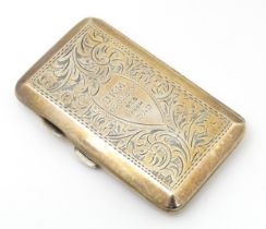 A silver cigarette case with acanthus decoration and engraved 'D. K. M. Oronsay ...', opening to