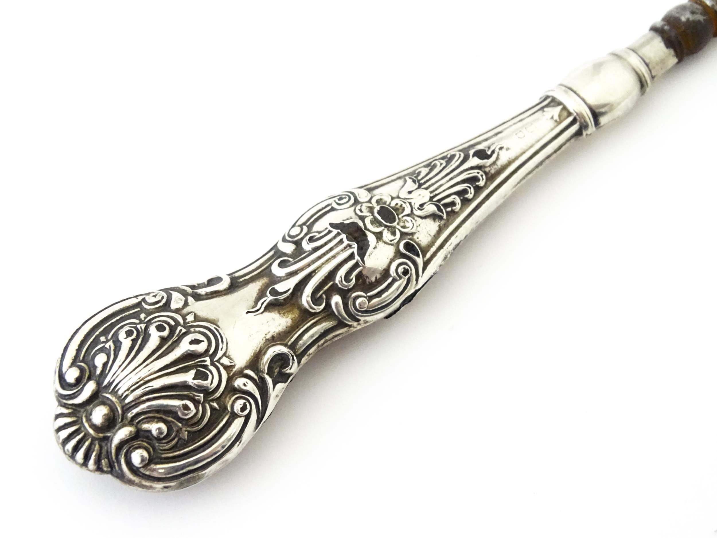 A silver handled button hook hallmarked Birmingham 1902. Approx 9" long Please Note - we do not make - Image 5 of 6