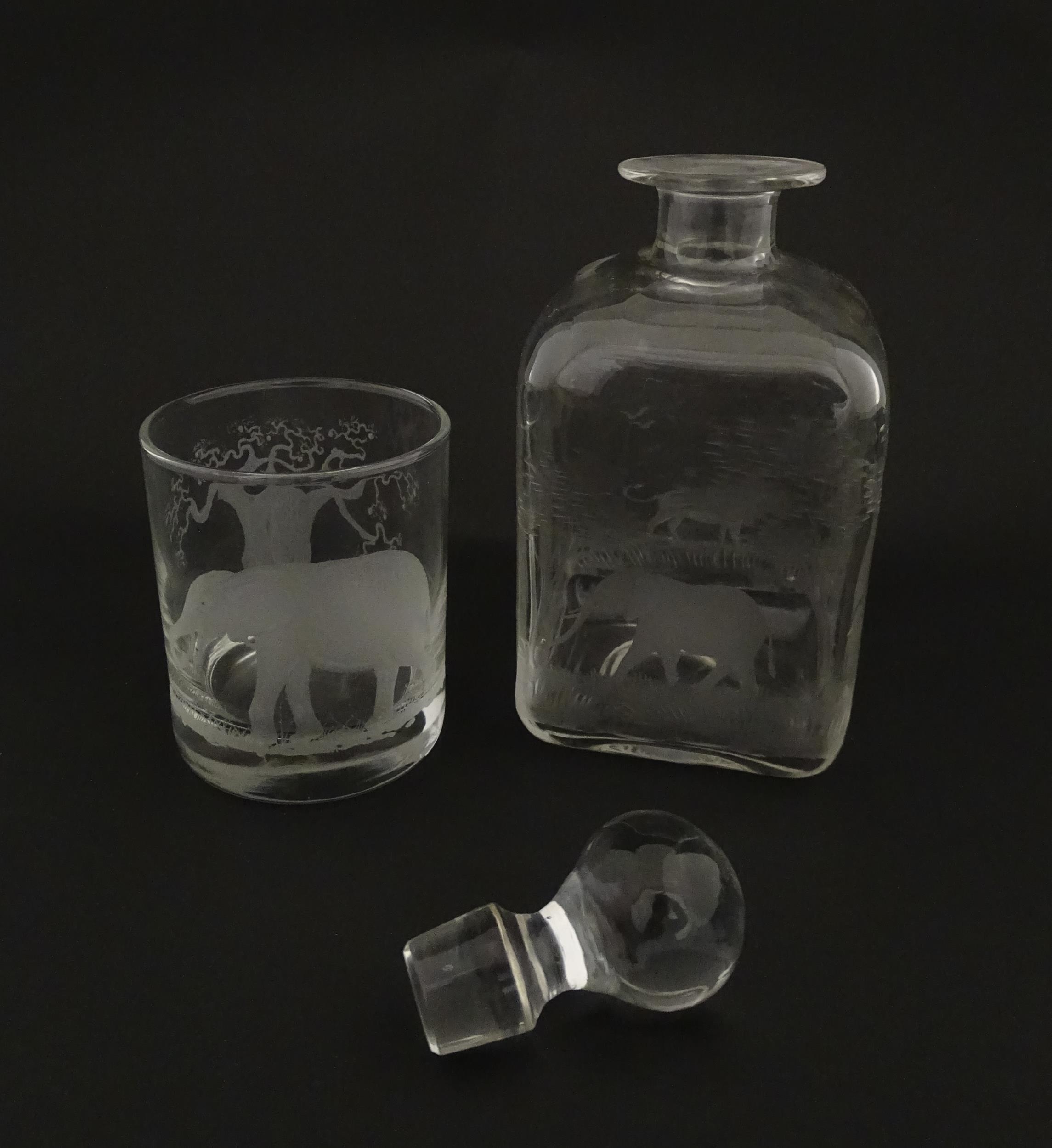 A Rowland Ward decanter glass with engraved Safari animal detail. Unsigned. Together with a similar - Image 3 of 11