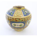 A Sicilian maiolica Bombola vase with panelled and banded decoration depicting flowers and