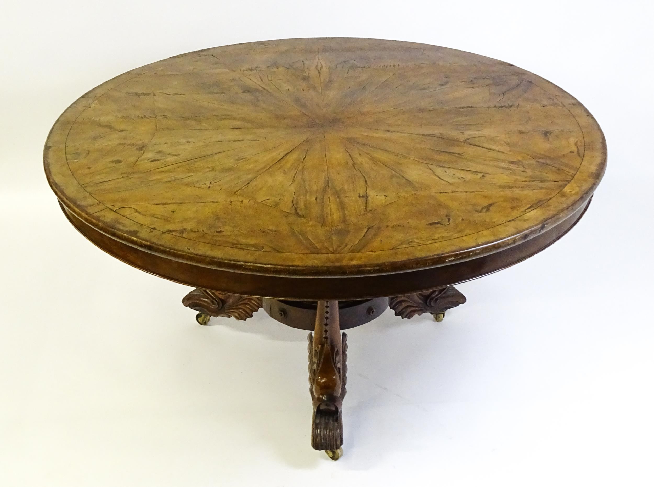 A 19thC dining table with an olive wood veneered circular top raised on a rosewood pedestal with - Image 14 of 15
