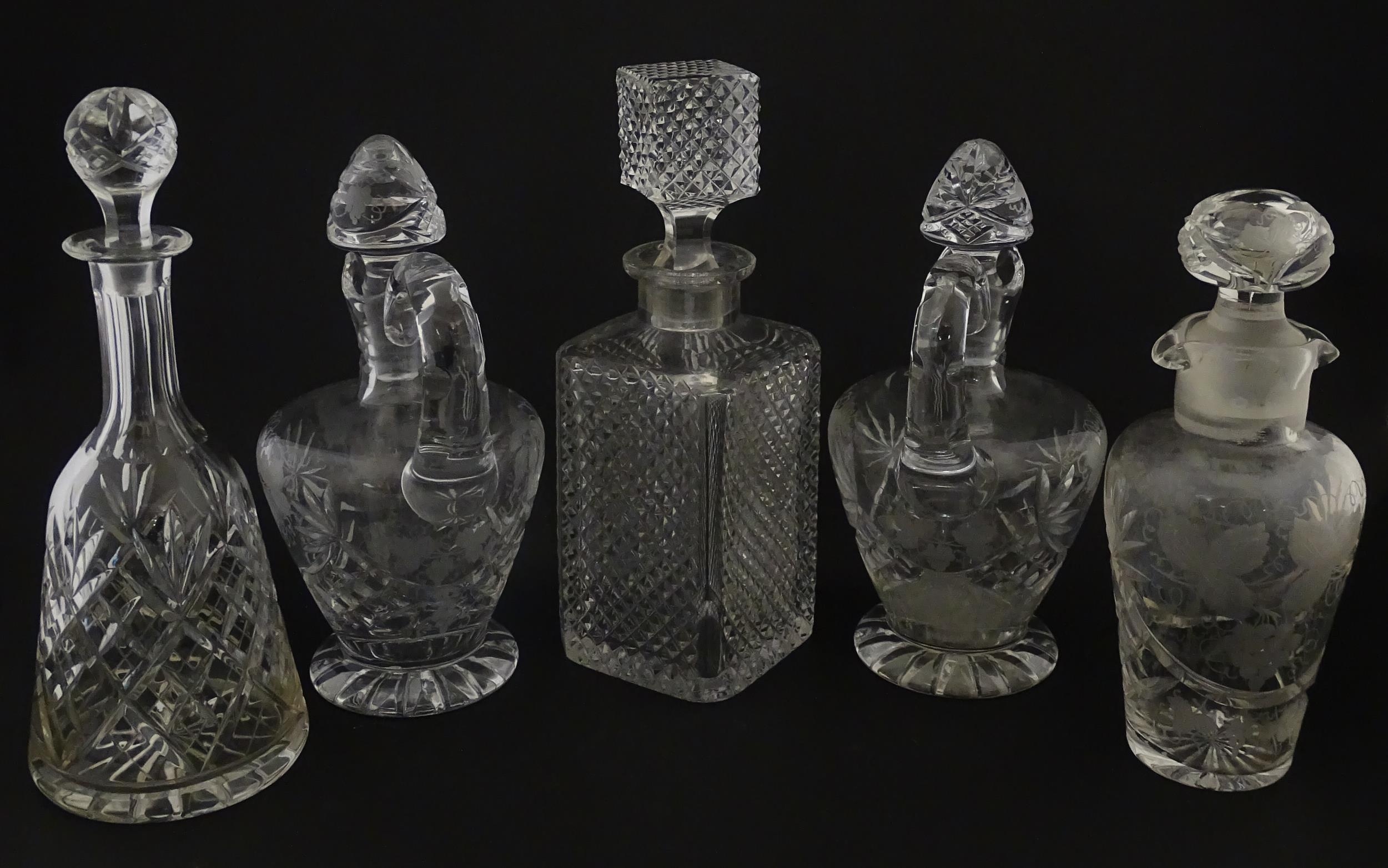 A quantity of assorted cut glass decanters, claret jugs, etc. Largest approx. 11 1/4" high (5) - Image 8 of 10