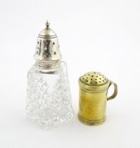 A cut glass sugar sifter with silver top hallmarked London 1961, maker Preece & Willicombe. Together