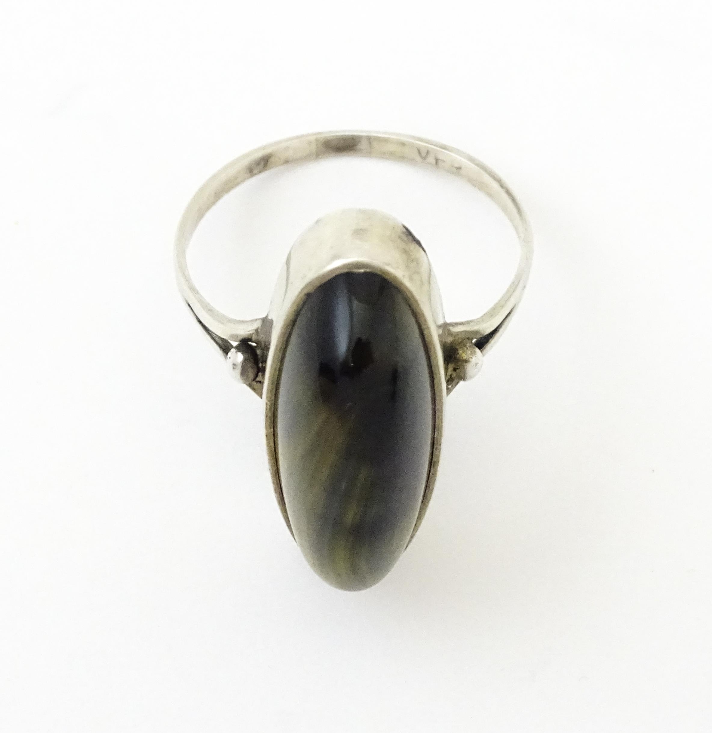A silver ring set with cabochon. Ring size approx. S Please Note - we do not make reference to the - Image 8 of 8