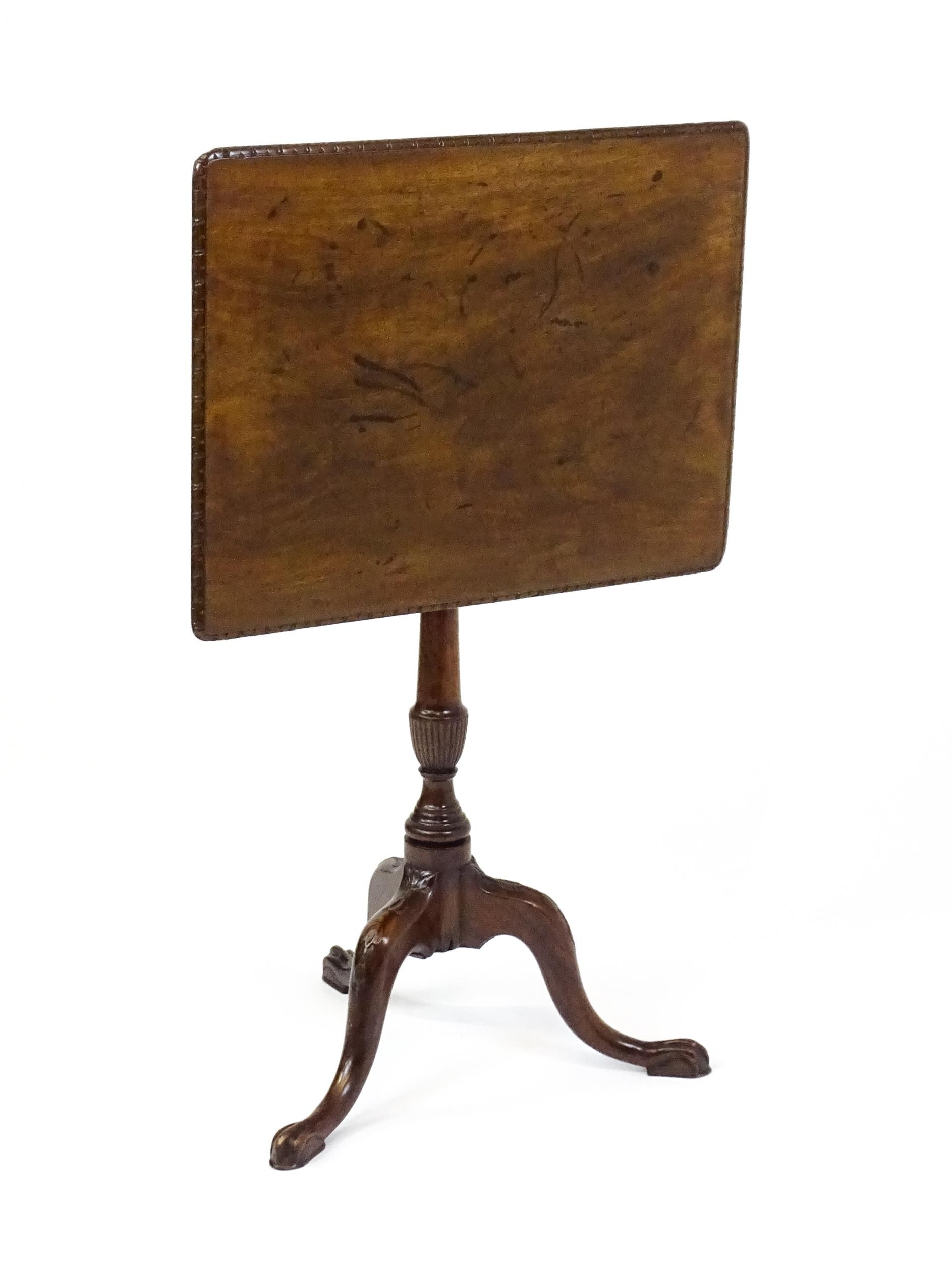 A late 18thC / early 19thC mahogany occasional table with a rectangular top and carved edge above - Image 4 of 12