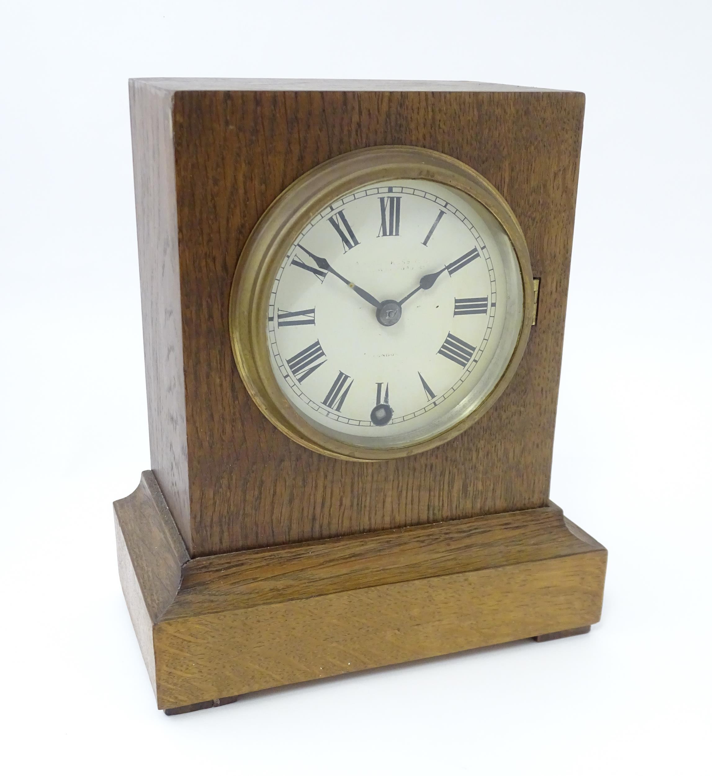 A 20thC oak cased mantle clock bearing label for Camerer, Kuss & Co. Approx. 9 1/4" high Please Note - Image 6 of 13
