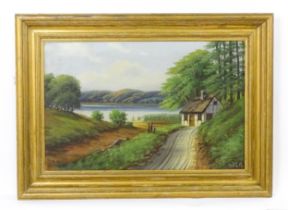 Early 20th century, Oil on canvas, A lake scene with a thatched cottage. Signed with initials FL and