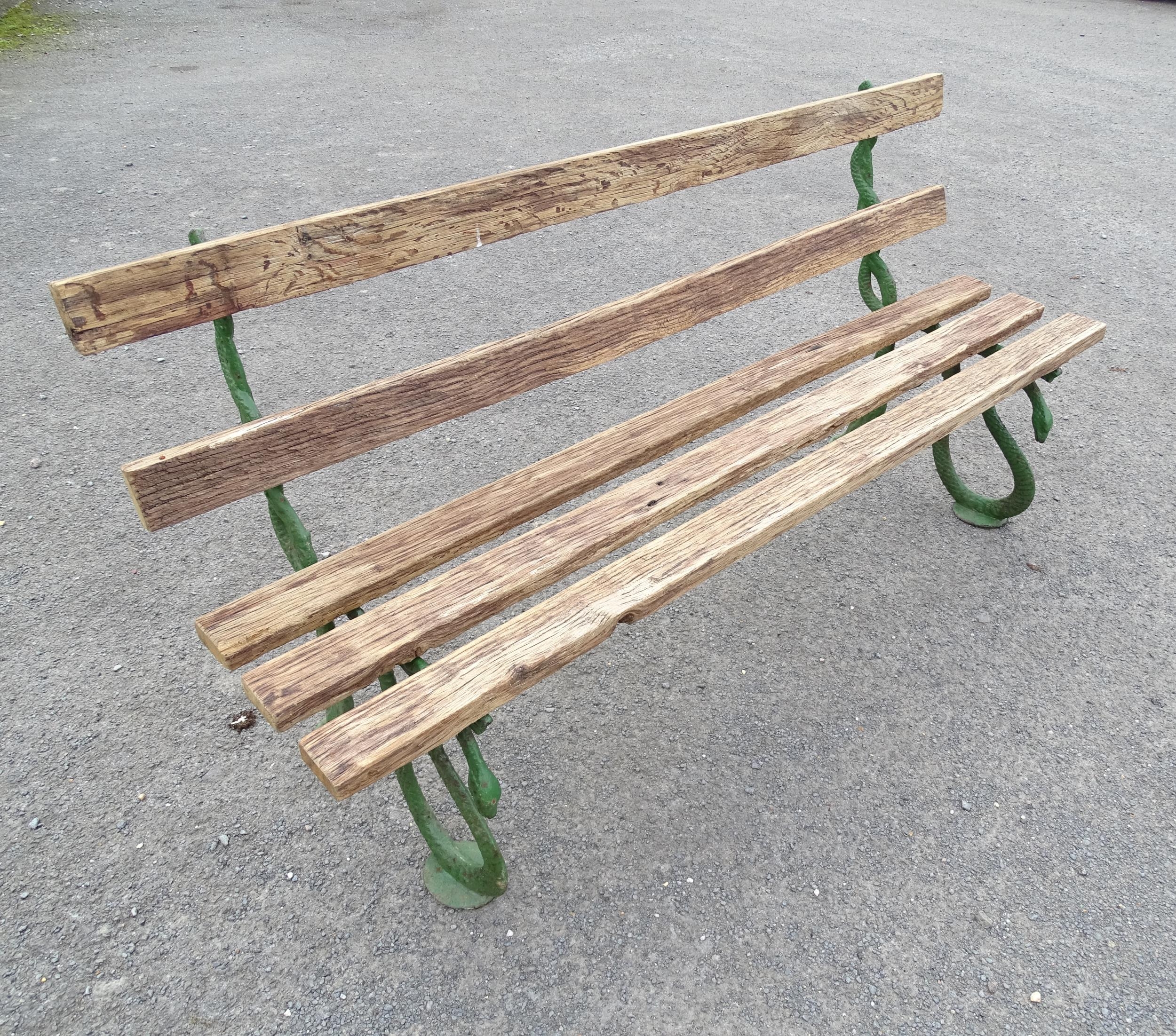 Garden & Architectural : a Coalbrookdale style cast iron and oak slatted garden bench, the - Image 2 of 8