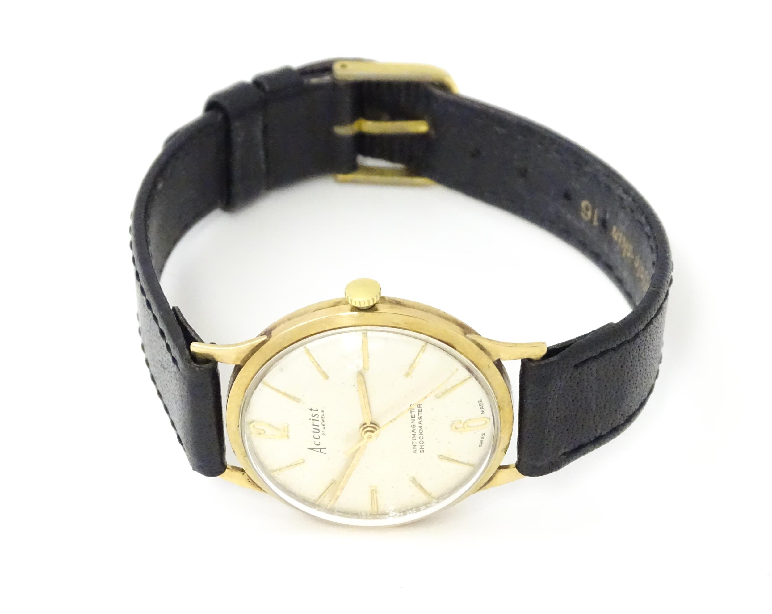 A Gentleman's 9ct gold cased Accurist wristwatch/ The watch approx 3 1/4" Please Note - we do not - Image 4 of 10