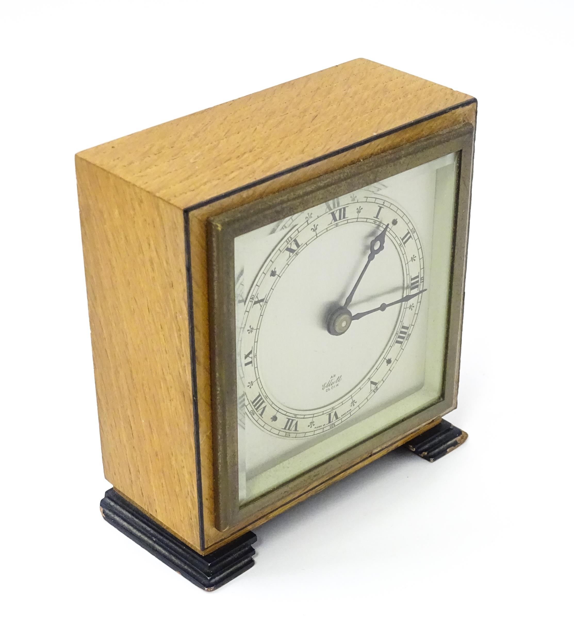A 20thC mantle clock by Elliott. the dial with Roman numeral chapter ring and signed ' An Elliott - Image 6 of 8