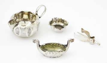 Assorted silver items to include a silver cream jug hallmarked Birmingham 1890 maker Stokes &