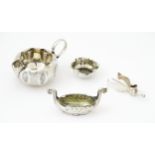 Assorted silver items to include a silver cream jug hallmarked Birmingham 1890 maker Stokes &