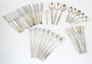 A quantity of WMF cutlery / flatware, to include knives, forks, spoons, etc. Knives approx. 8"