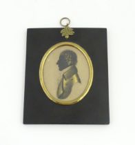 A 19thC silhouette portrait miniature depicting Charles Lamb, aged 23, with gilt highlights, after