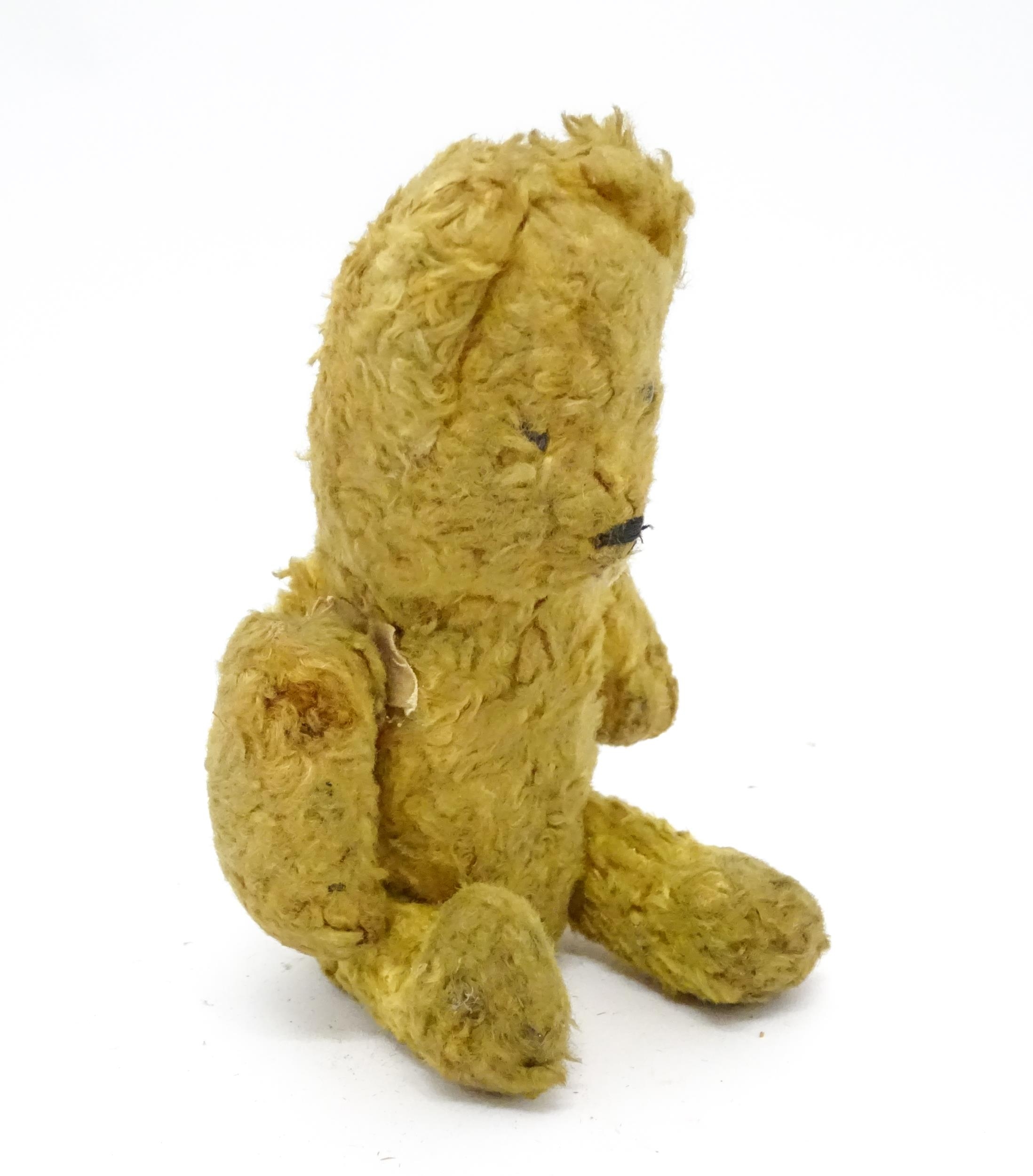 Toy: An early 20thC straw filled teddy bear with stitched nose and articulated limbs. Approx. 7" - Image 2 of 7