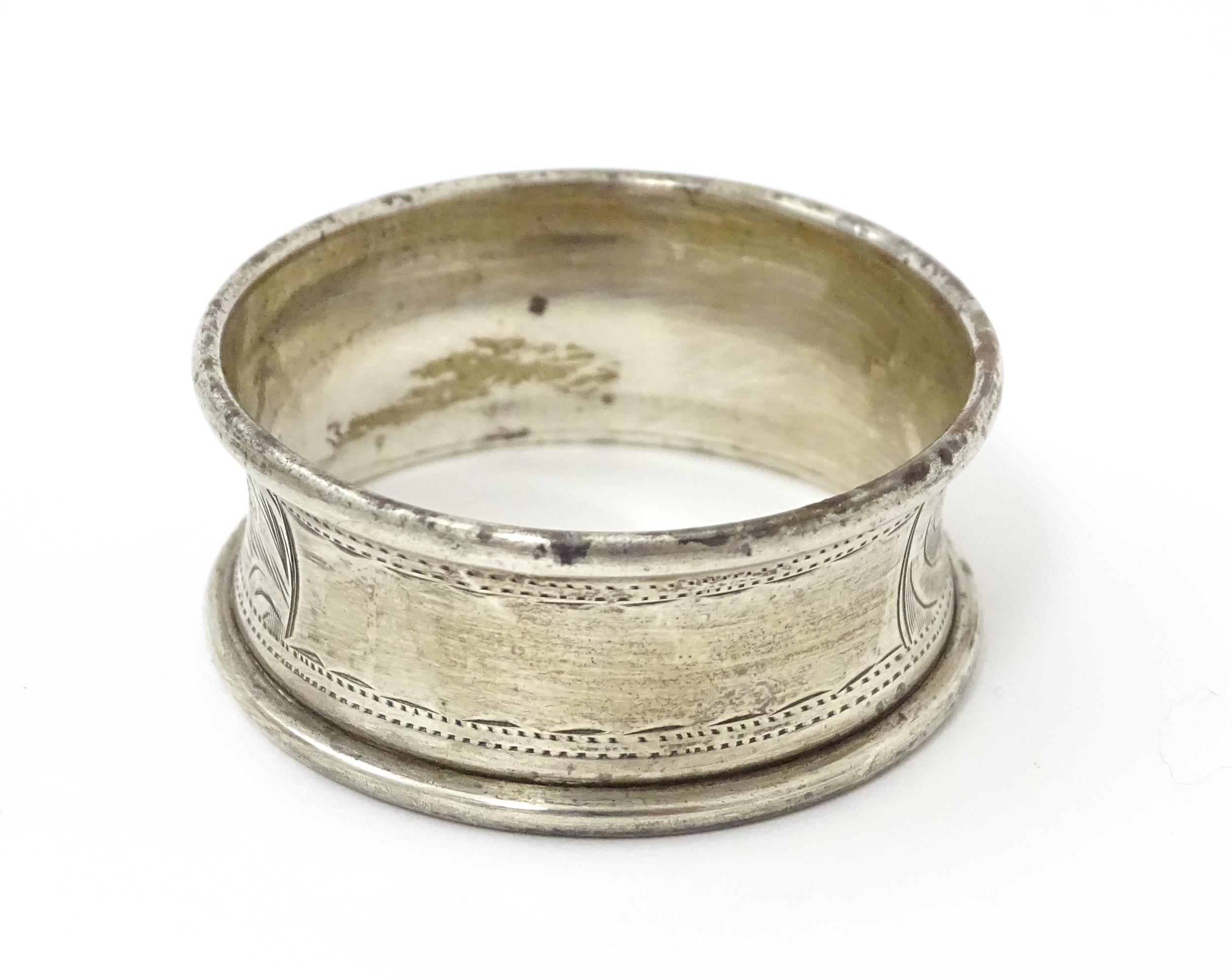 Two silver napkin rings with engraved foliate decoration, one hallmarked Birmingham 1928 maker - Image 7 of 8