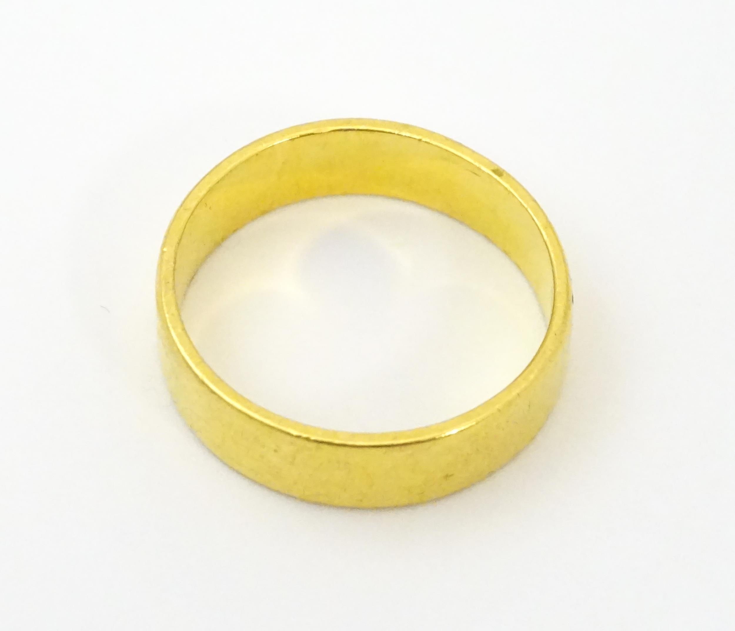 A 22ct gold ring / wedding band. Ring size approx. M 1/2 Please Note - we do not make reference to - Image 5 of 6