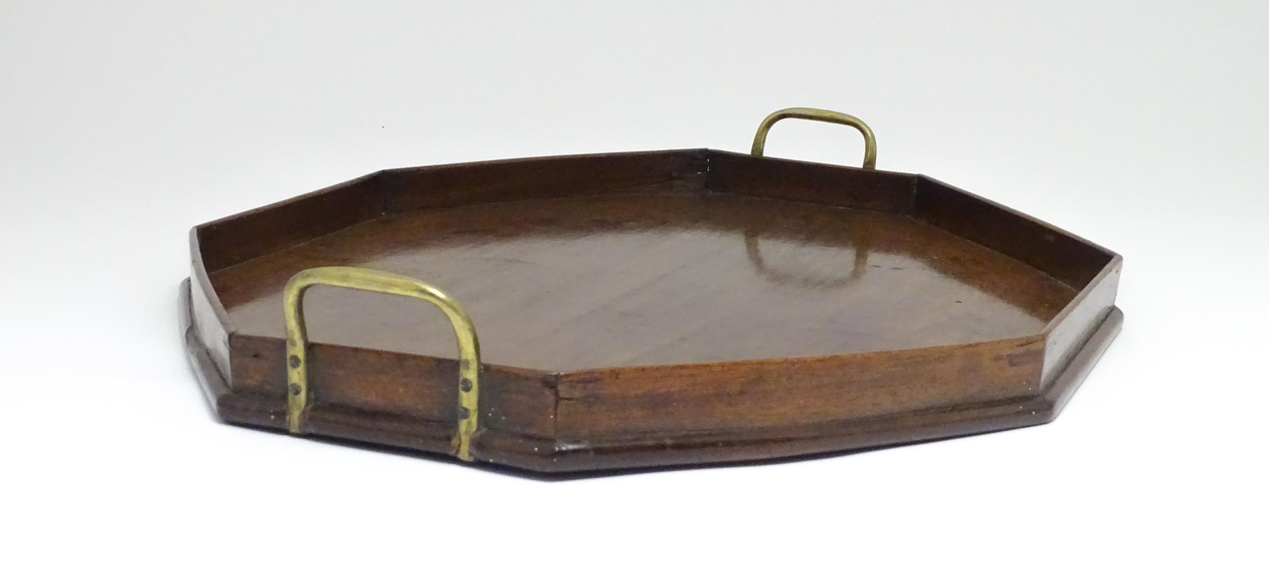 A late 19th / early 20thC mahogany tray of octagonal form with twin handles. Approx. 21 1/4" x 16 - Image 3 of 7