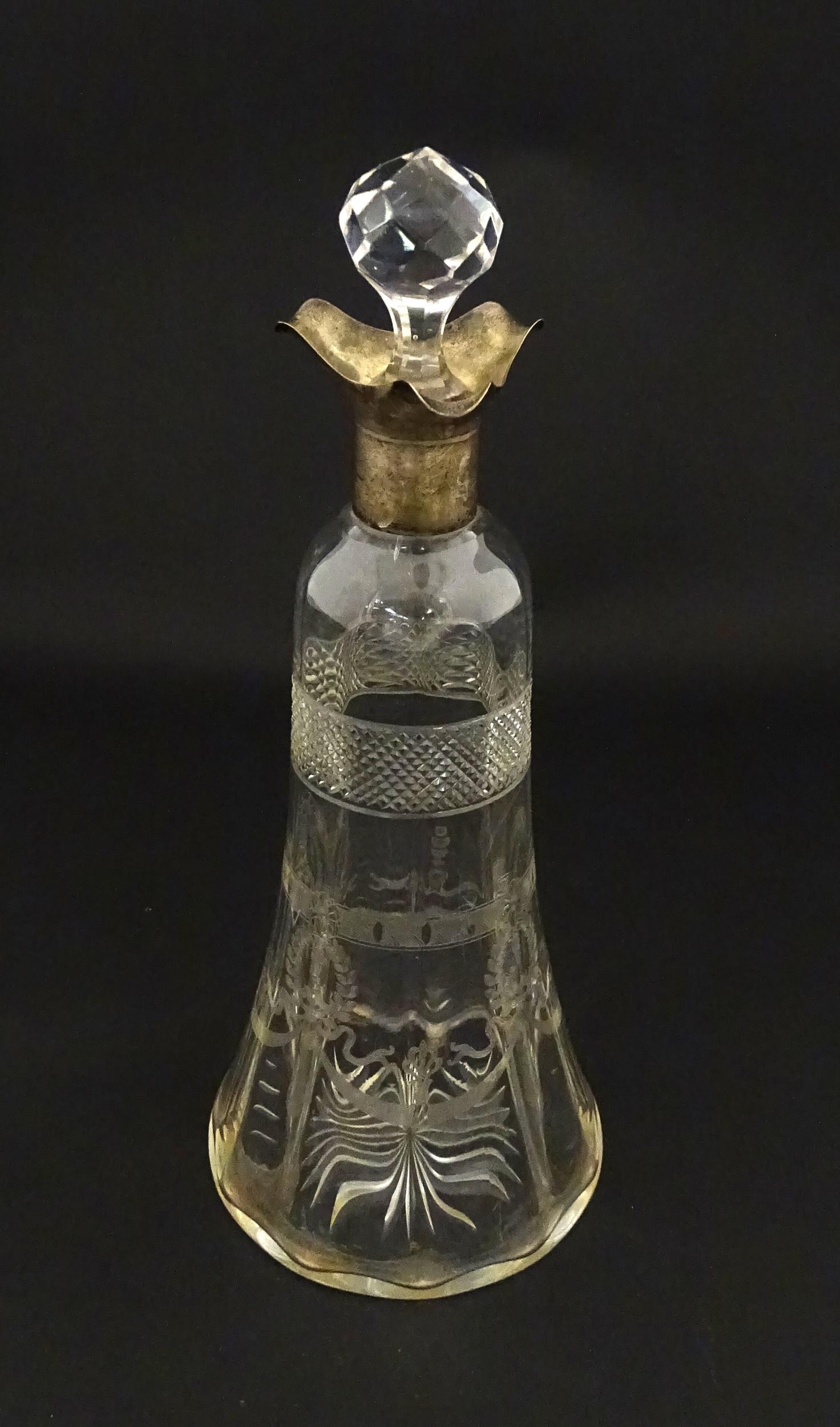 A cut glass decanter with silver mounts hallmarked Birmingham 1911. Approx. 9 1/4" high Please - Image 5 of 9