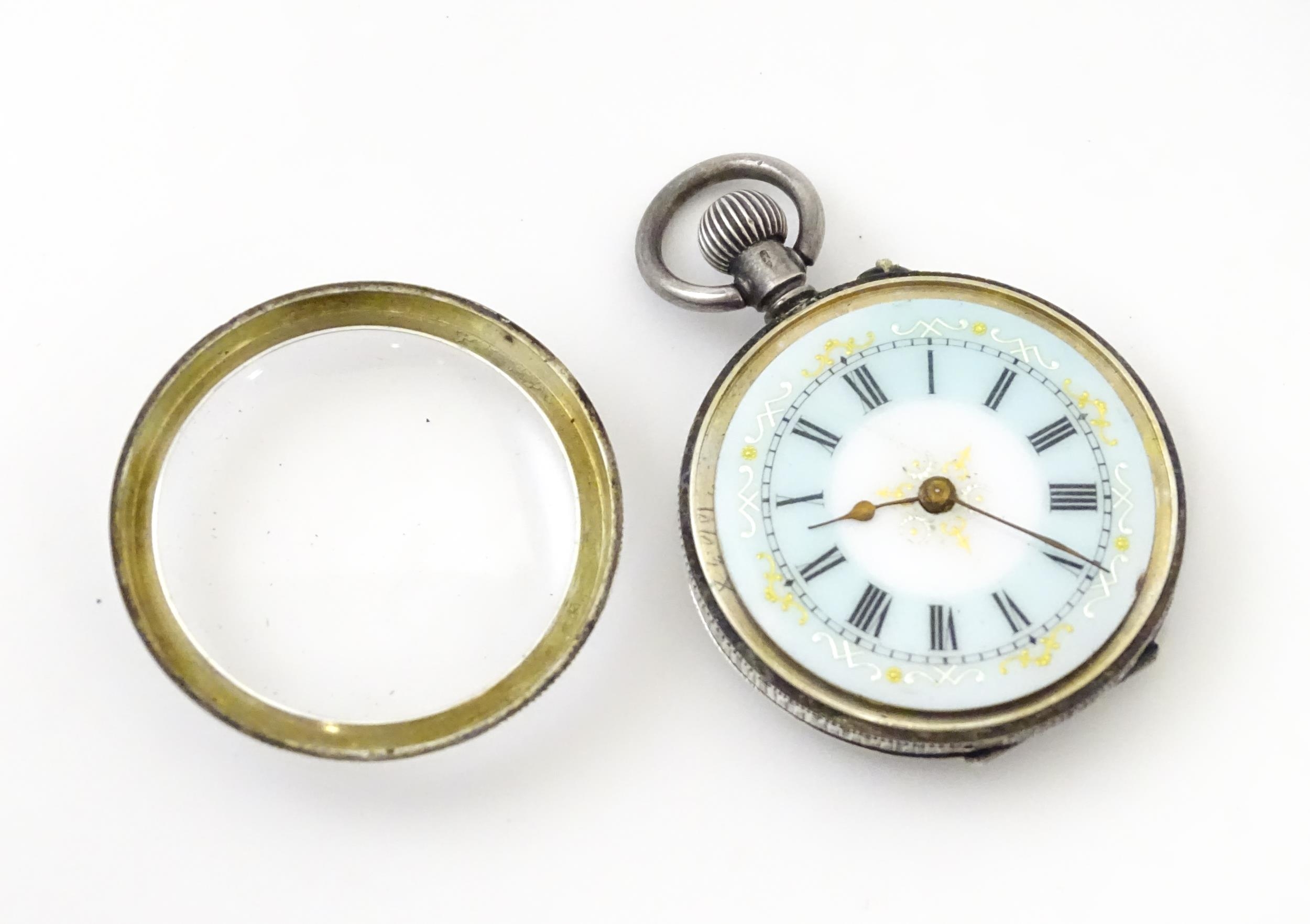 A Swiss silver cased pocket / fob watch with enamel detail and Roman Numerals. Approx 1 /4" wide - Image 7 of 11