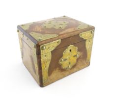 A 19thC fruitwood box with engraved brass mounts, opening to reveal a glass lined interior.