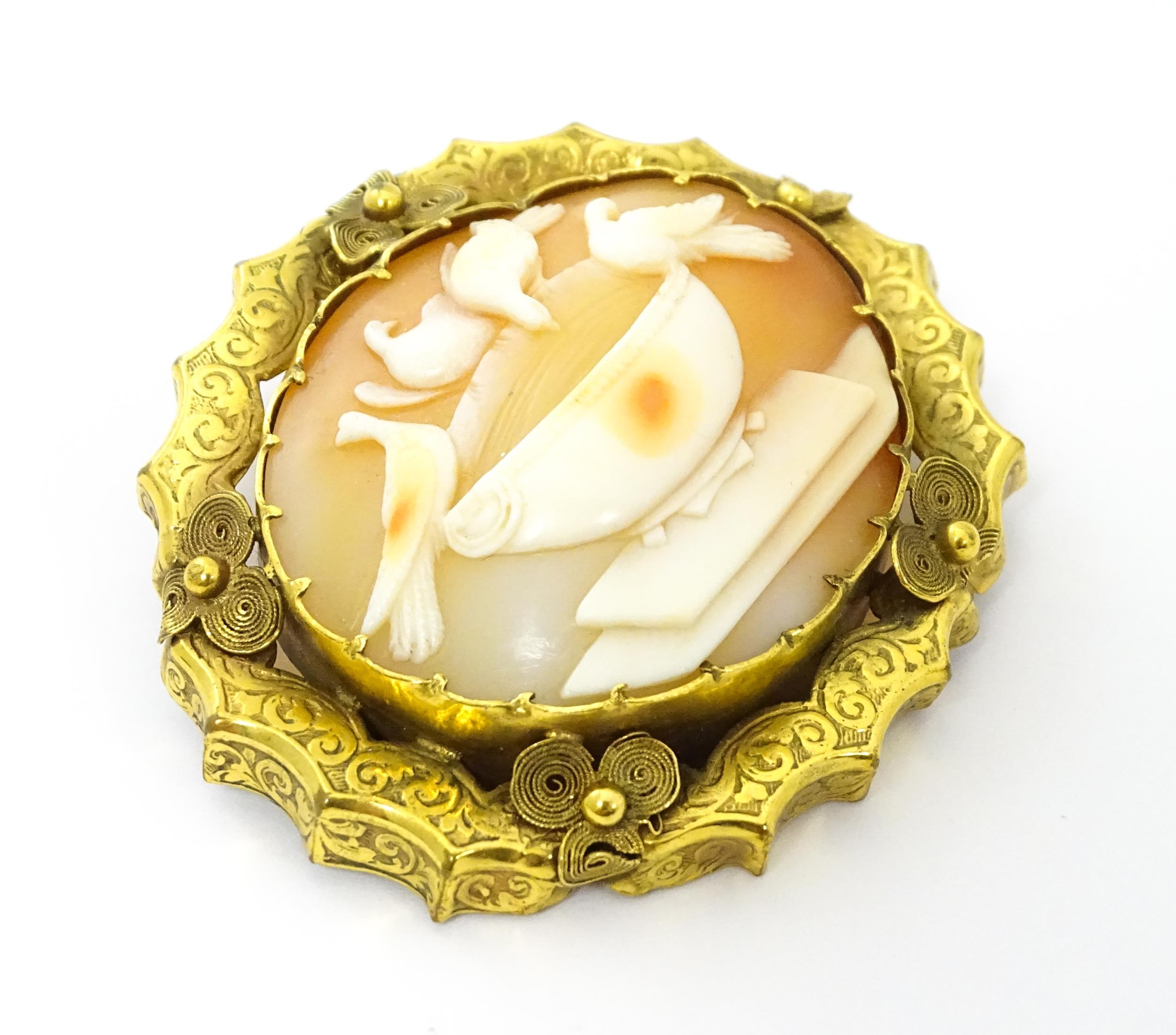 Two cameo brooches, one a classical cameo set within a .800 silver mount. The other a Victorian - Image 4 of 11