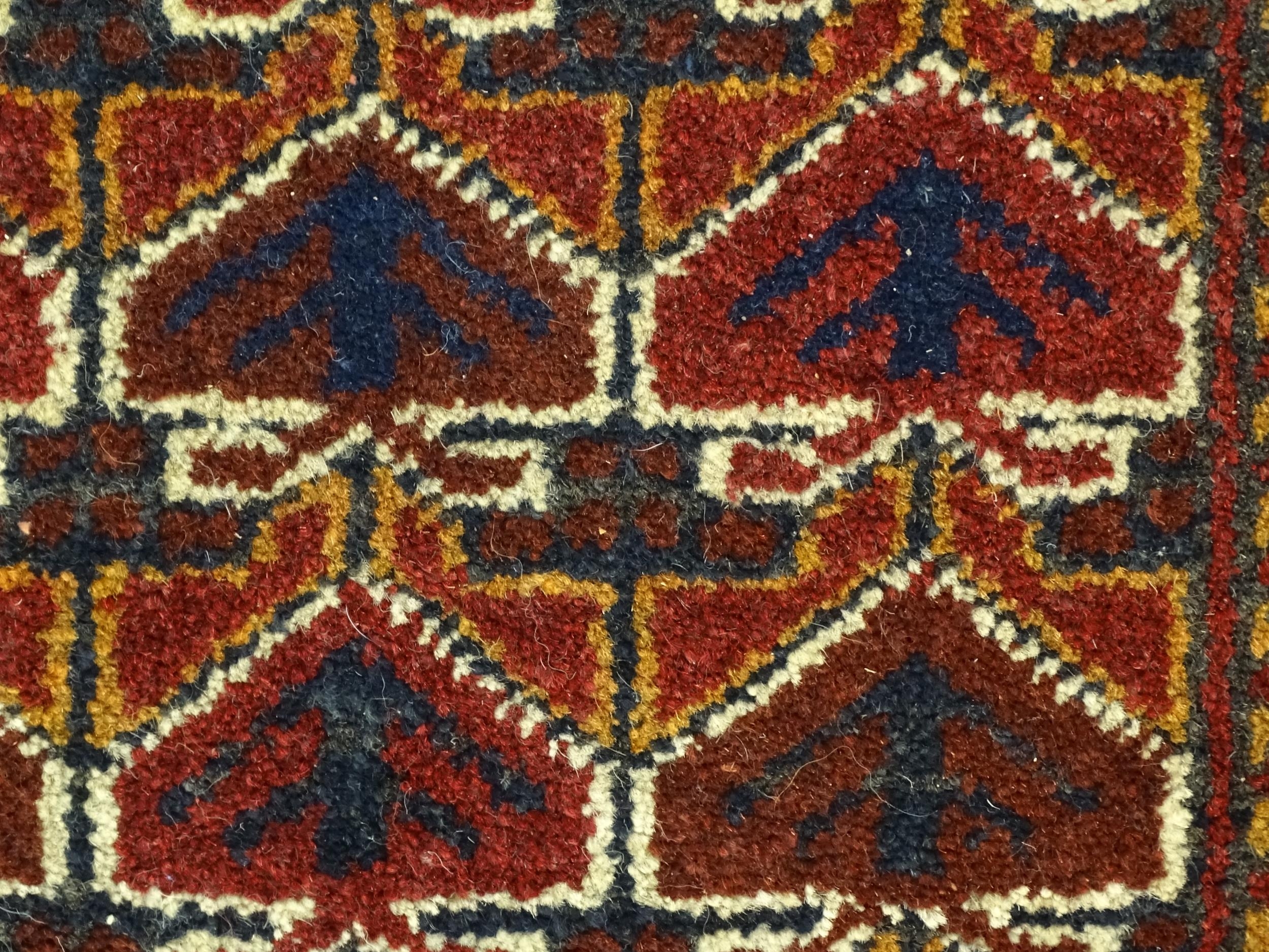 Carpets / Rugs: Two small rugs, one with burgundy ground with repeating motifs, the other with - Image 6 of 6