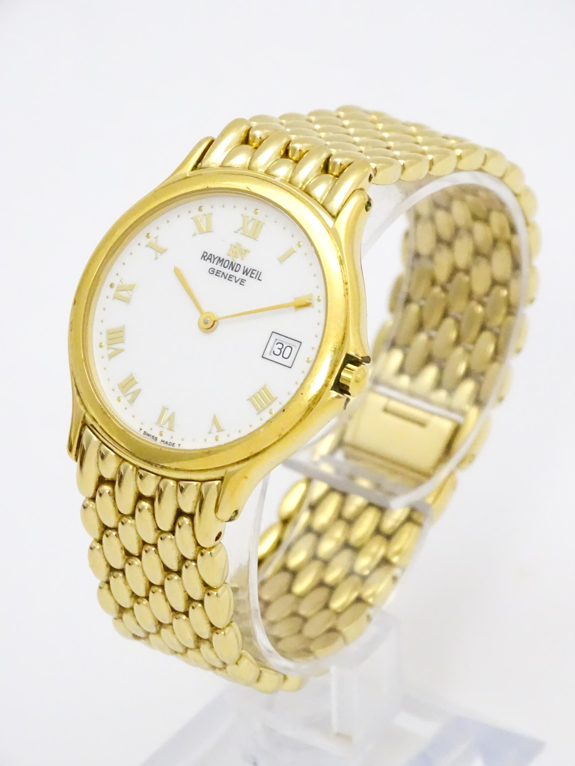 A Raymond Weil gold plated stainless steel Chorus quartz bracelet wristwatch, ref. 5568, the dial