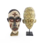 Ethnographic / Native / Tribal: Two African carved wooden masks with carved decoration, on with