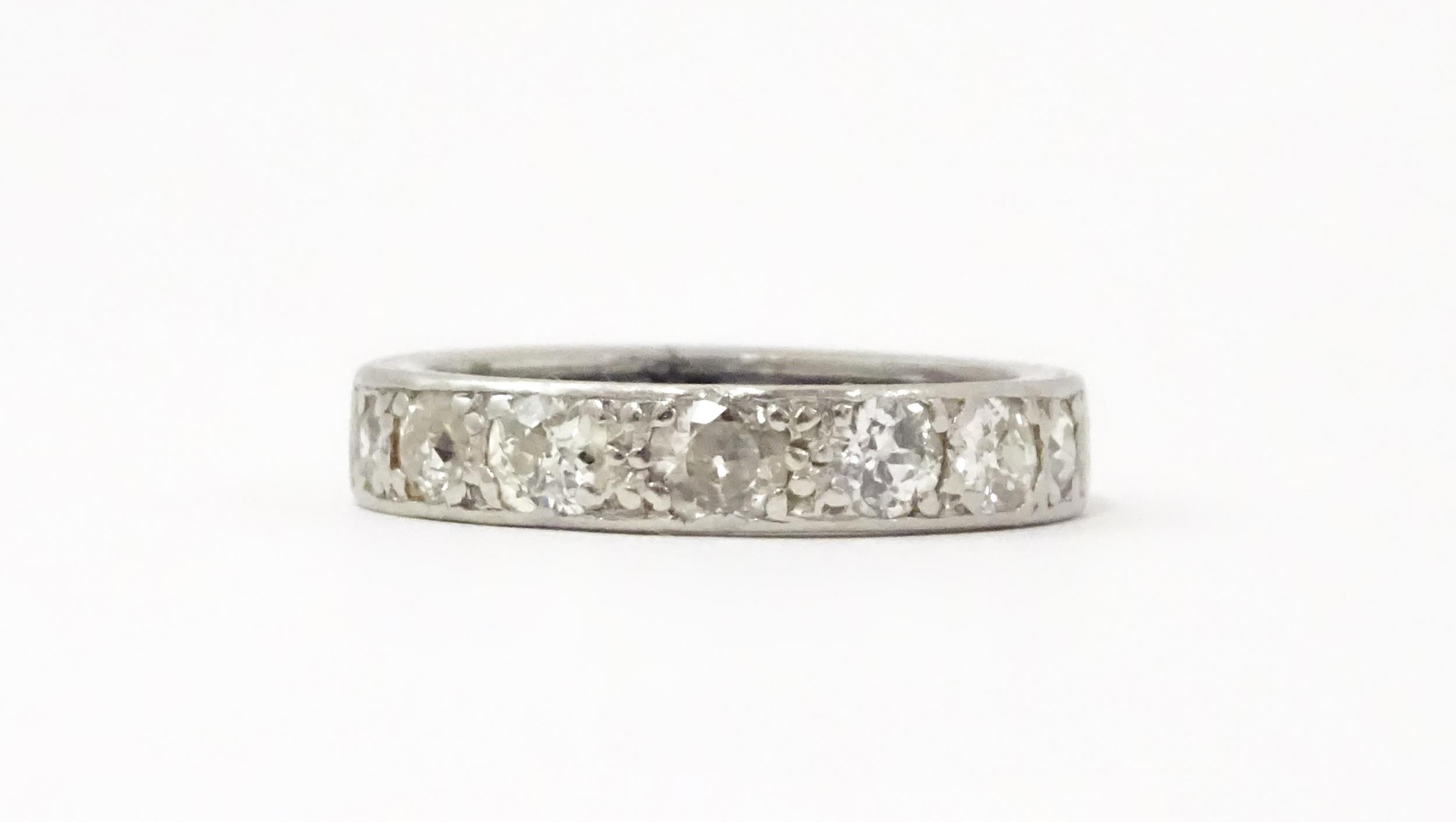 A diamond half eternity ring set with 7 diamonds. Ring size approx. L Please Note - we do not make - Image 3 of 9