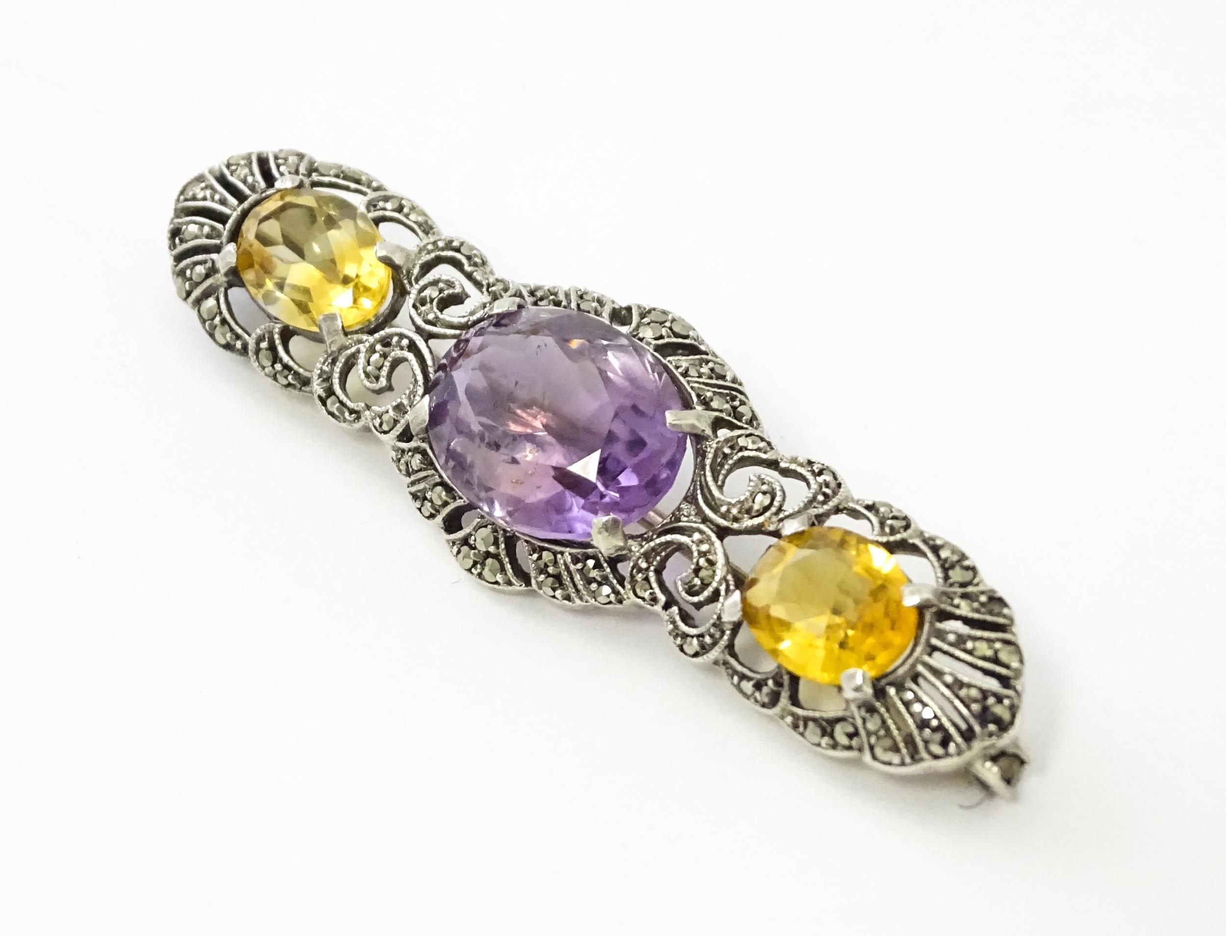 A silver brooch set with amethyst, citrine and marcasite. Approx 2 1./4" wide Please Note - we do - Image 4 of 8