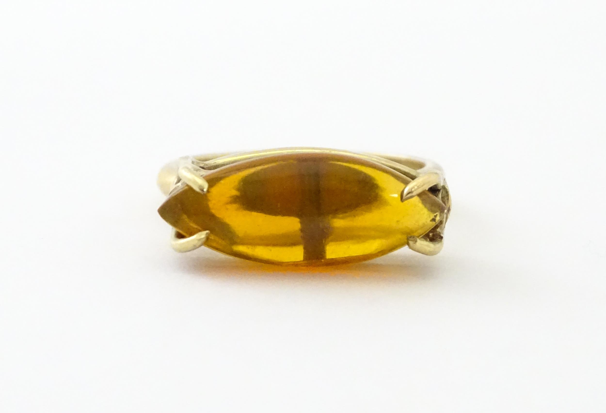 A 9ct gold ring with fire opal approx 3/4" long. Ring size approx. M Please Note - we do not make - Image 2 of 7
