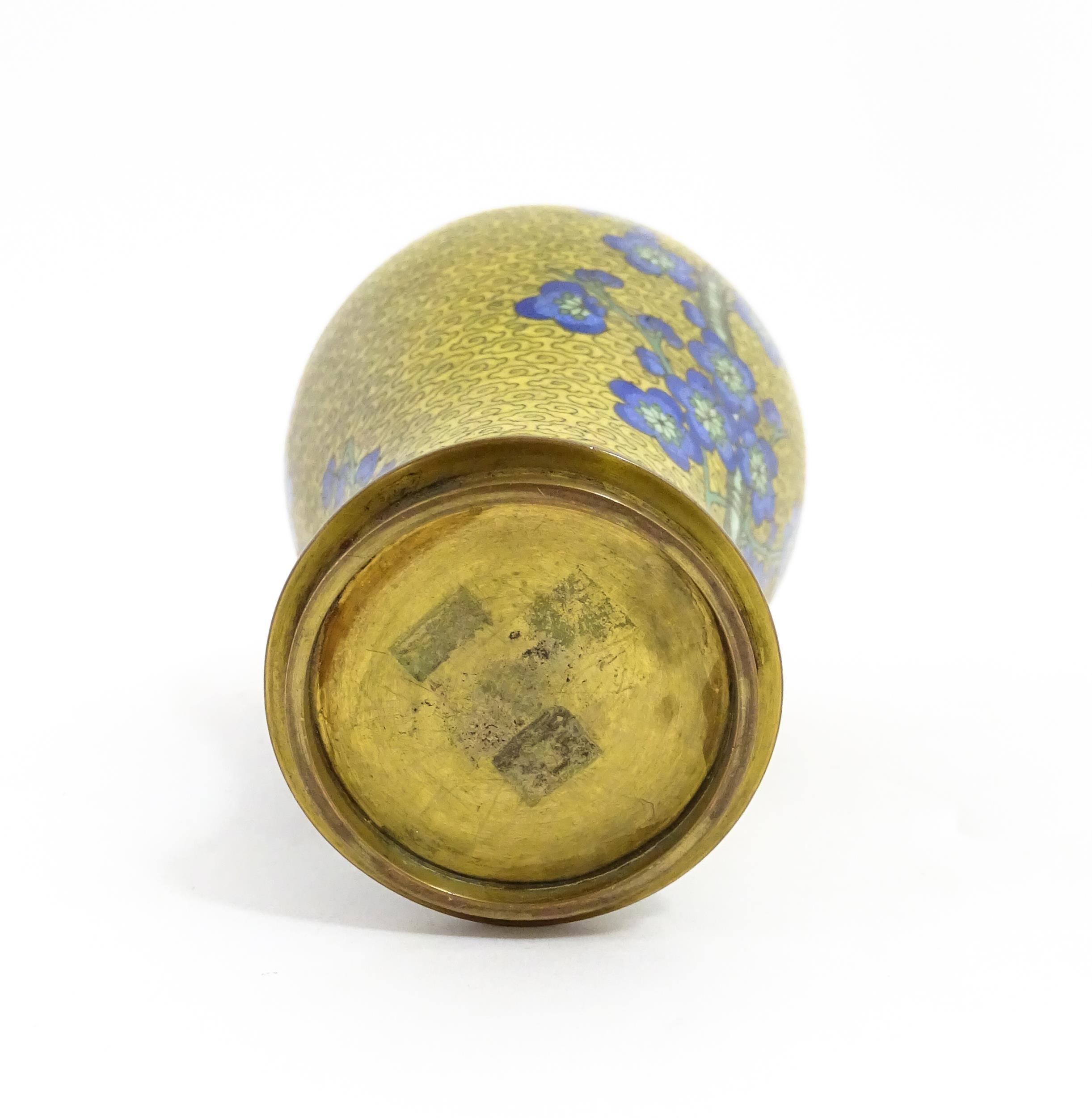 A Chinese cloisonne vase with a yellow ground decorated with blue prunus flowers / blossom. - Image 6 of 7