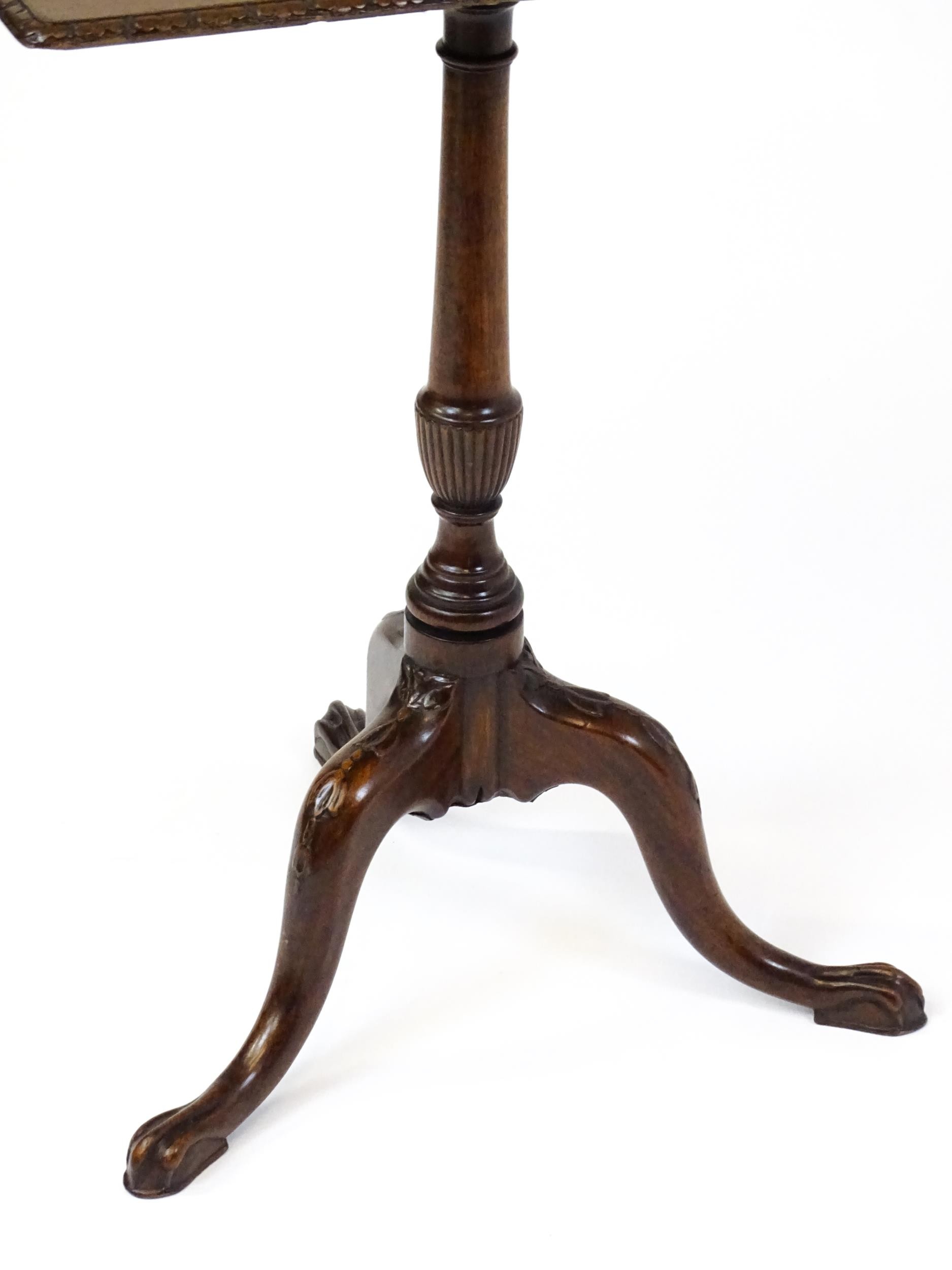 A late 18thC / early 19thC mahogany occasional table with a rectangular top and carved edge above - Image 6 of 12