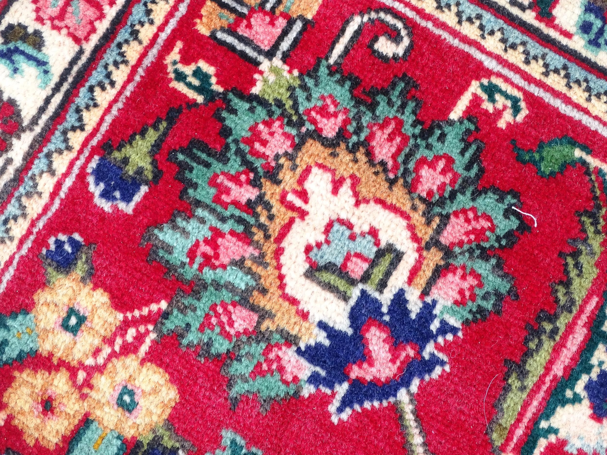 Carpet / Rug: A North West Persian Tabriz carpet the red ground with central cream and blue - Image 9 of 11