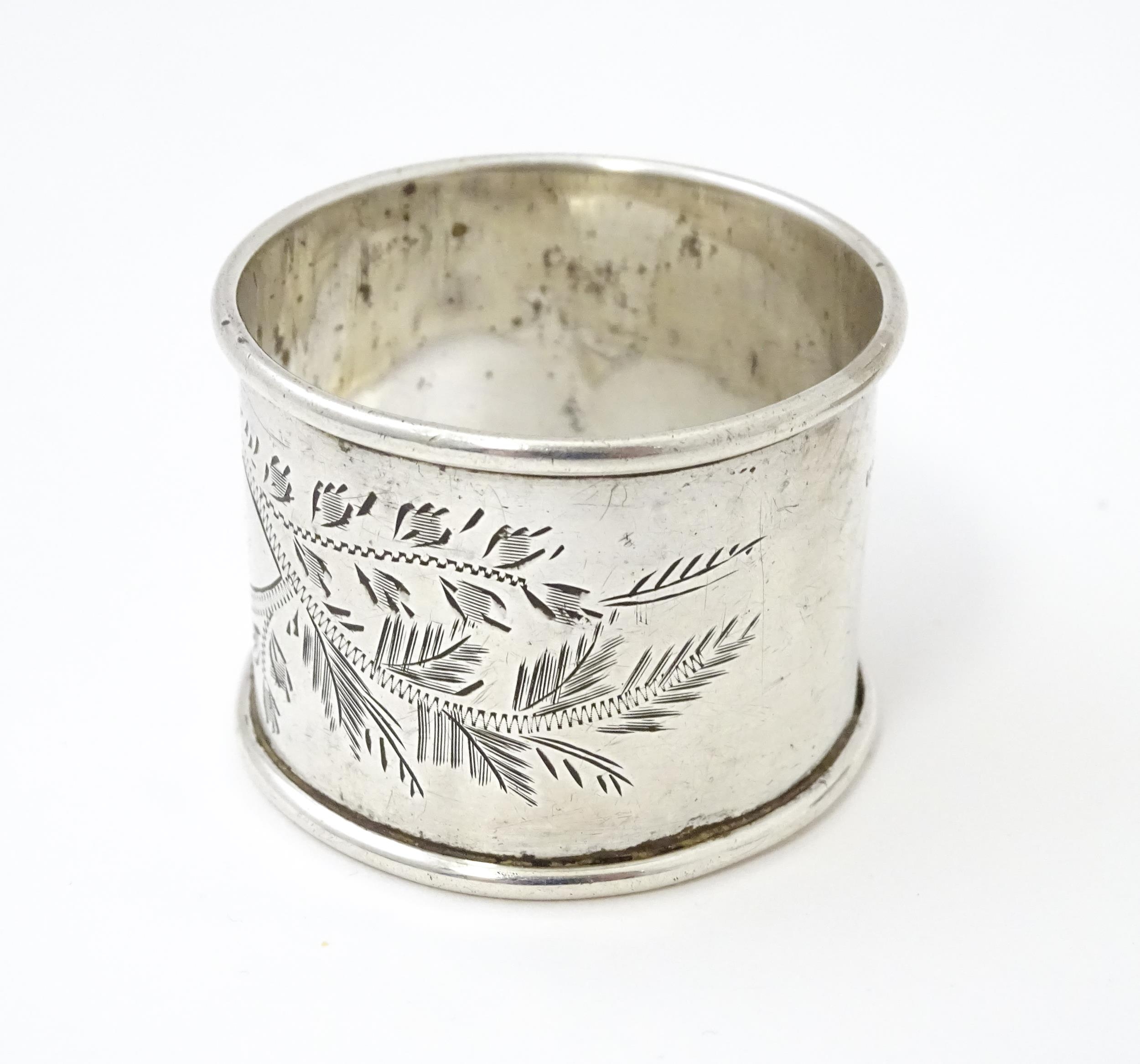 Two silver napkin rings with engraved foliate decoration, one hallmarked Birmingham 1928 maker - Image 8 of 8