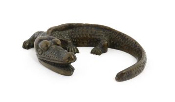 A 20thC cast bronze model of a crocodile / alligator. Approx. 5 1/4" wide Please Note - we do not