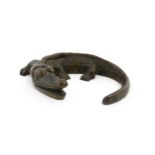 A 20thC cast bronze model of a crocodile / alligator. Approx. 5 1/4" wide Please Note - we do not