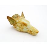 A creamware stirrup cup formed as a fox head, in the manner of Whieldon. Approx. 4 3/4" long
