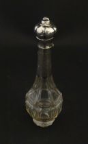 A glass scent / perfume bottle with a Dutch silver top, c. 1810. Approx. 4 3/4" high Please Note -