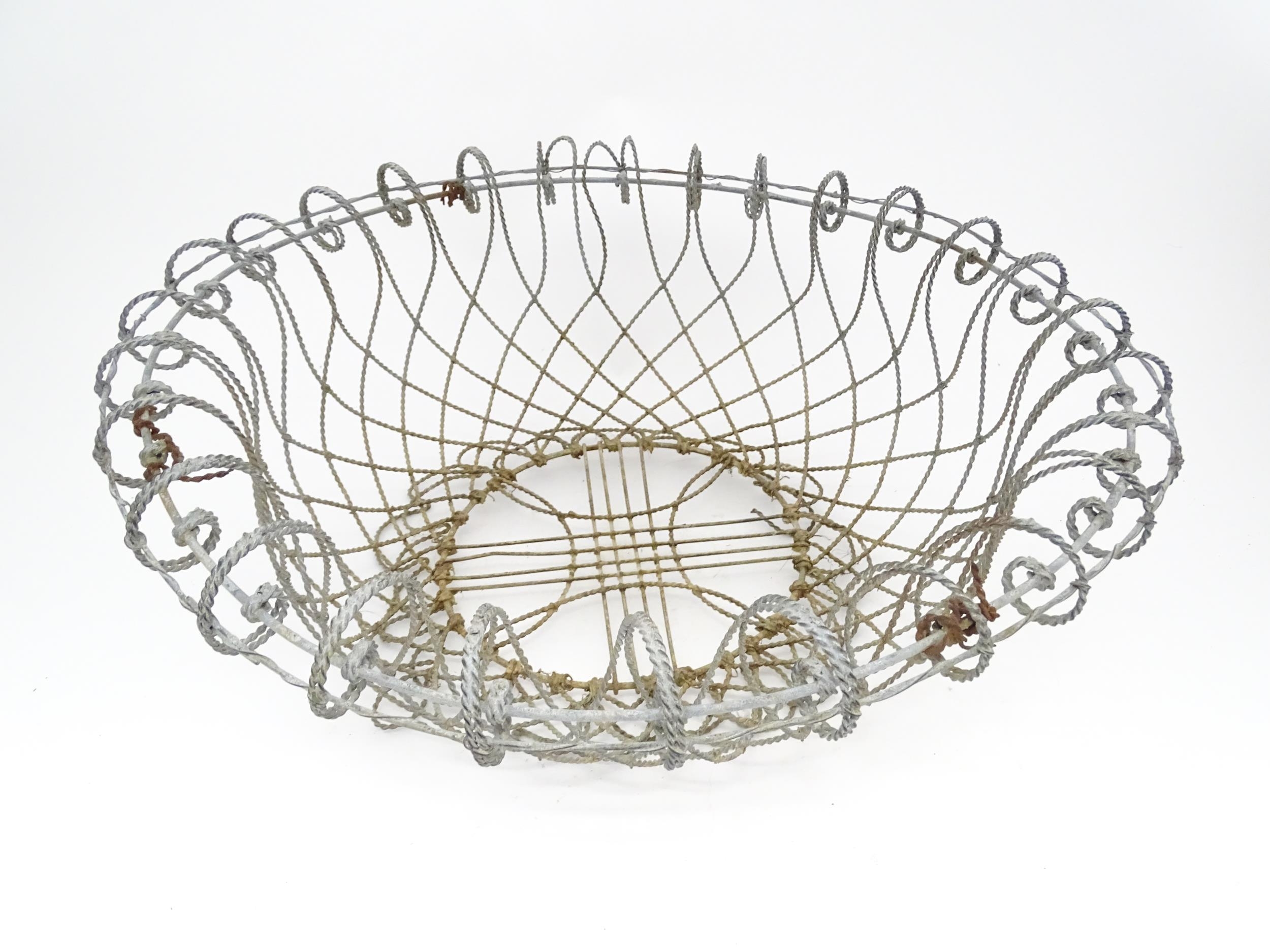 A pair of 19thC wirework planters / baskets with scrolling detail. Each approx. 24" in diameter x 8" - Image 7 of 15