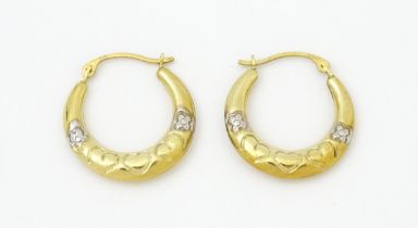 A pair of 9ct gold hoop earrings. Approx. 3/4" long Please Note - we do not make reference to the