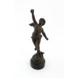 A 20thC cast model of Cupid in the manner of Jean-Louis Gregoire. Approx. 12 1/2" high Please Note -