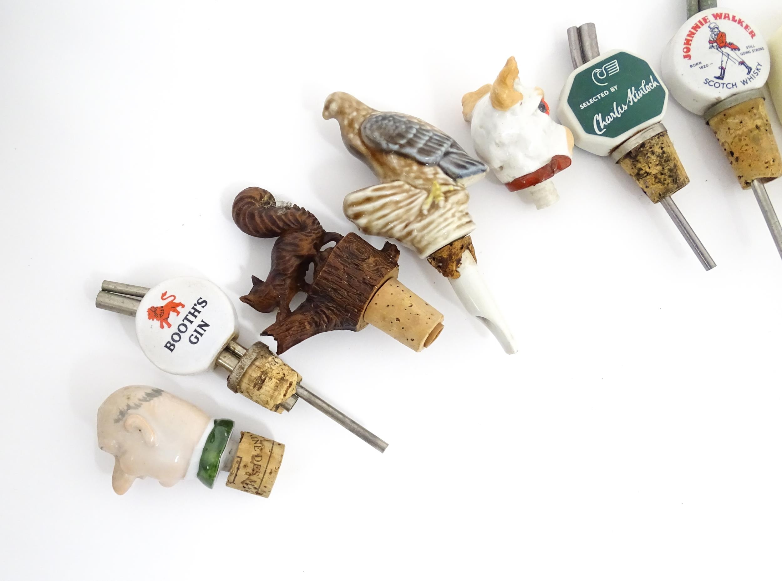 Breweriana : A quantity of assorted 20thC advertising bottle stoppers / pourers to include Booth's - Image 13 of 16