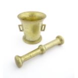 A 19thC brass pestle and mortar, the mortar of tapering form with twin rectangular handles. Mortar